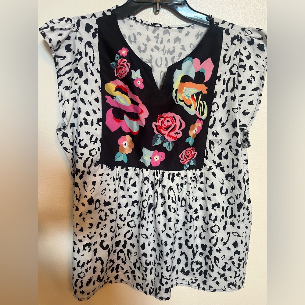 Used Black/white with floral. Thin material. Large. Tag removed.